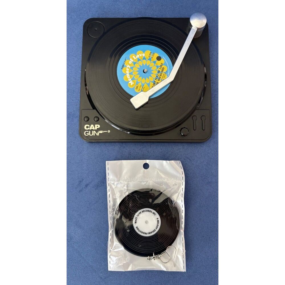 Melody Ensani Productions Earrings & Preowned Cap Gun Vinyl Coasters